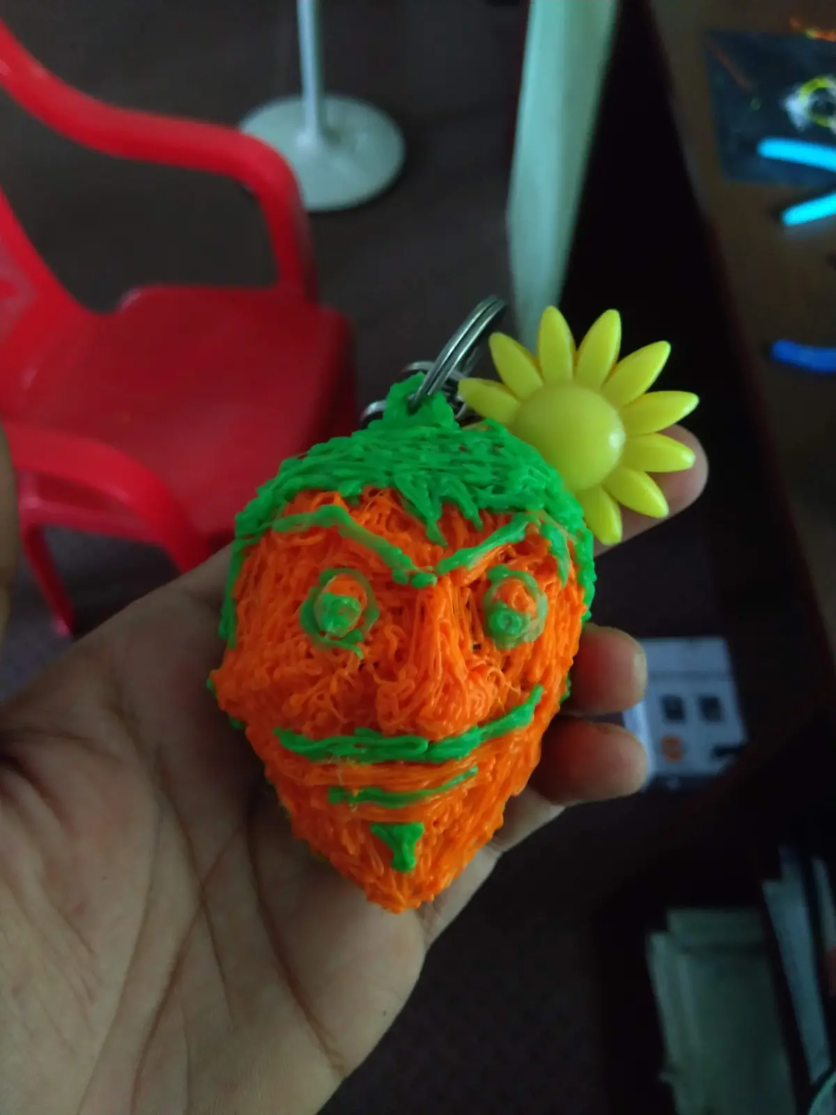 A keychain drawn freehand with a 3D pen.